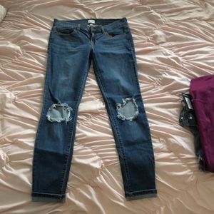 denim jeans with wholes in knees